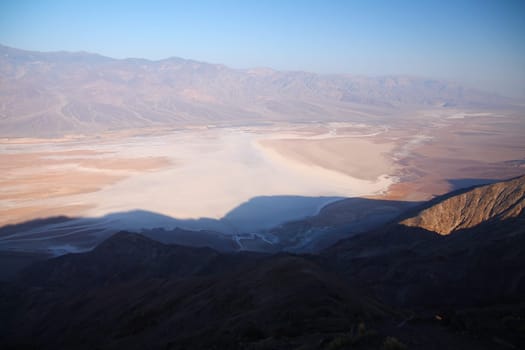 The white salt dried lake of Badwater Basin from the top of the mountain in the Death Valley desert