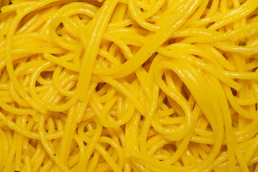 Pasta in oil close up. background with cooked spaghetti