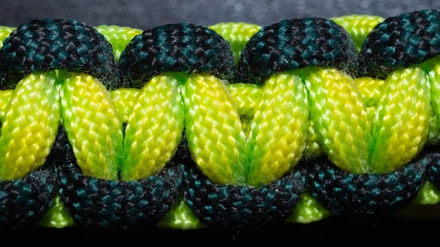 Braided paracord bracelet with knots macro