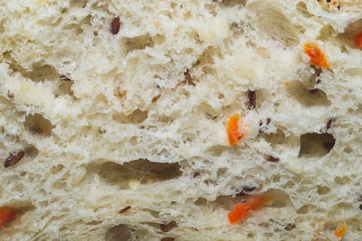 Slice of bread with seeds close up background