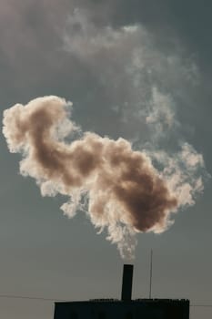 Air pollution from power plant chimneys. Industry and global warming concept