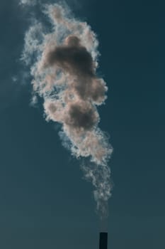 Air pollution from power plant chimneys. Industry and global warming concept