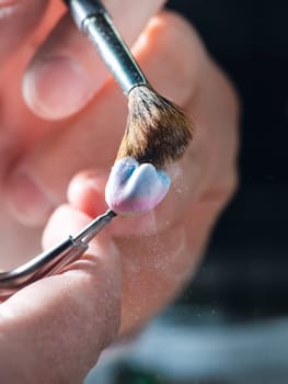 Dental prosthesis, artificial tooth, prosthetic, hands working on the denture, false teeth.