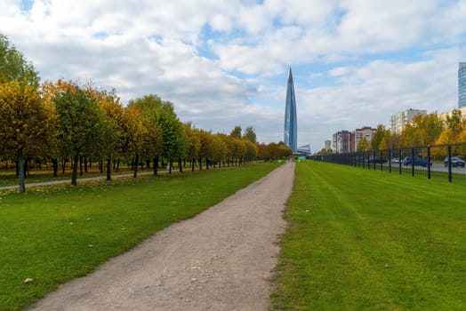 Autumn Park named after the 300th anniversary of St. Petersburg with a view of the Lakhta Center. Saint-Petersburg. Russia.