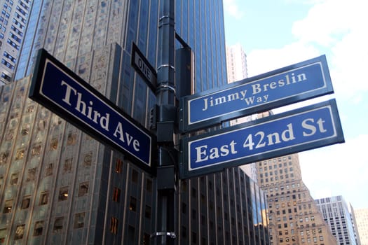 Blue East 42nd Street and Third 3rd Ave historic sign ( Jimmy Breslin Way ) in midtown Manhattan in New York