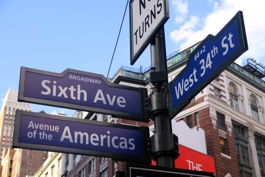 Blue West 34th Street, Broadway and Avenue of the Americas 6th historic sign in Midtown Manhattan in New York City