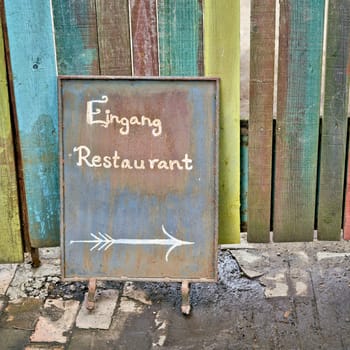Sign with the inscription Eingang Restaurant in the center of Berlin. Translation on the sign: Entrance Restaurant