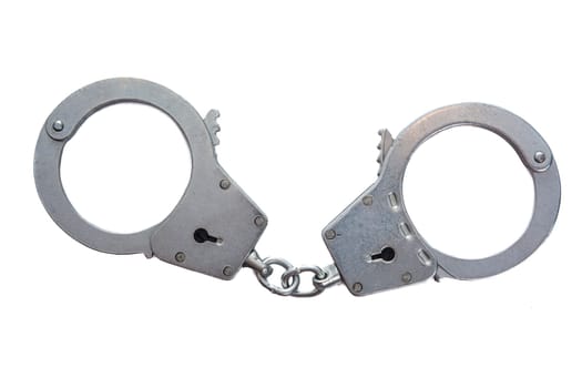 Metal handcuffs on a white isolated background. High quality photo