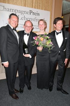 Thibaut le Mailloux (Comite Champagne),Denis Scheck (literature critic and prize-winner) with wife Christina Schenk and Christian Josephi (Comite Champagne),awarding of the Champagne Prize for Joie de vivre at the Hotel Louis C. Jacob,Hamburg,27.04.2015