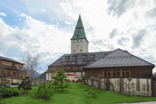 Klais, Germany - April 26, 2015: Facade of luxury hotel Elmau royal palace which will be the official venue of the most influential politicians on G7 summit 2015.