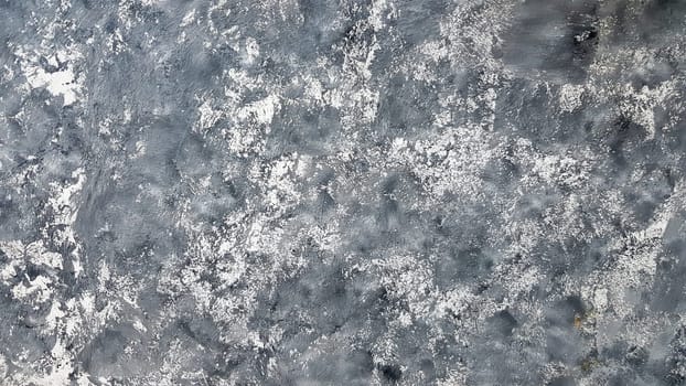 Texture of gray decorative plaster or concrete. Abstract background for design. Decorative plaster effect on wall