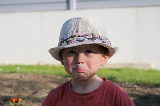 a portrait of sad young boy