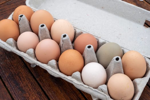 a Carton container with chicken eggs