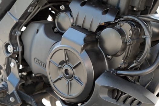 a close up of engine of motorcycle