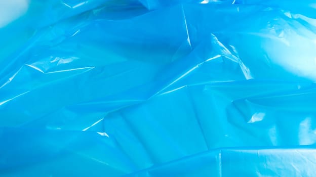 Blue plastic bag texture and background. A bag that is designed to accommodate garbage in it and is used at home and placed in various garbage containers