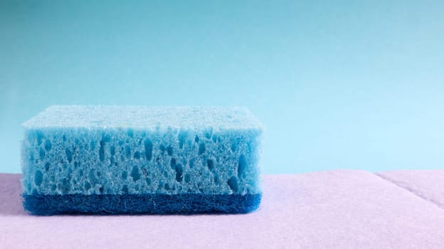 One blue sponge used to wash and erase dirt used by housewives in everyday life. They are made of porous material such as foam. Detergent retention, which allows you to spend it economically.