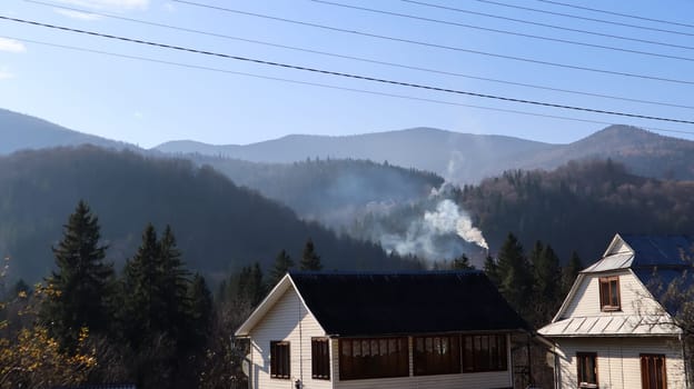 A small town or village of Yaremche among the Carpathians on an autumn afternoon. Ukraine, Yaremche - November 20, 2019