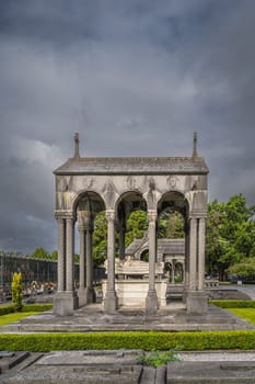 Dublin, Ireland, August 2019 Ancient, beautifully ornate sarcophagus and graves in Glasnevin Cemetery
