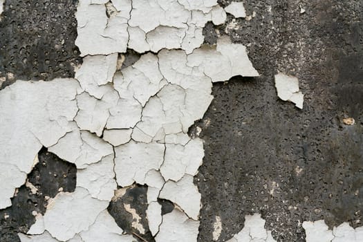 peeling paint on the facade of a house in Berlin