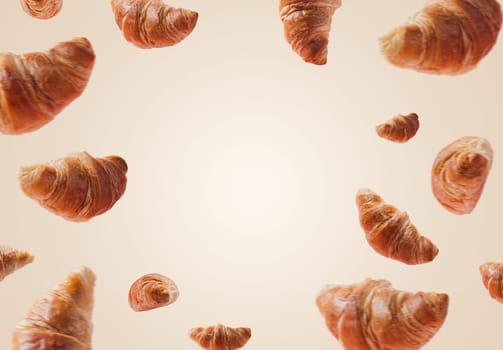 Freshly baked croissants levitating or flying. Set of many croissants from different position and angle fly in the air isolated on white beige background. Copy space place for text. Signboard mockup