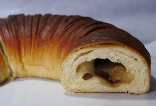 pie roll with sweet filling in the cut close-up