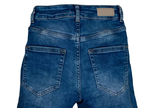 Jeans isolated. Trendy stylish blue denim pants or trousers isolated on a white background. Clipping path. summer and autumn fashion. Back view.
