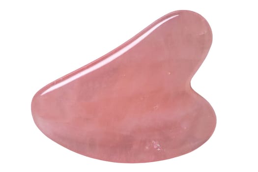 Natural Gua Sha Rose quartz Stone isolated. Guasha Massage Tool alternative therapy to improve circulation. Face stone massage.  Clipping path. Chinese healing method to better health.