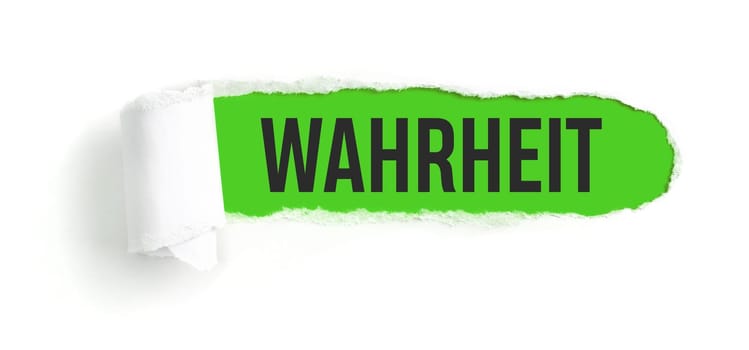 Hole in white paper with torns edges - Truth in german - Wahrheit