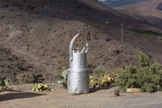 Giant blowtorch in the garden of Villa Mogan, the historic windmill Molino de Viento, Mogan, Gran Canaria, Spain