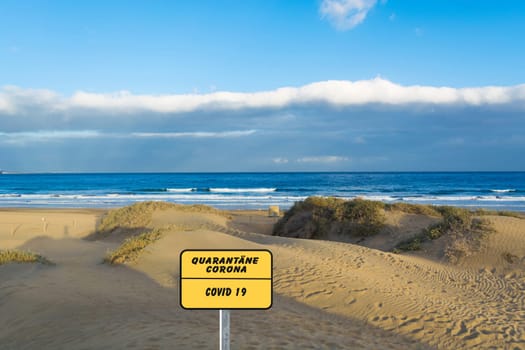 Beach area closed due to Corona covid-19, German text for Beach closed