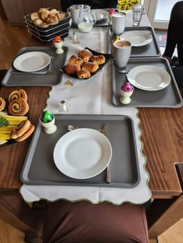 Traditional easter breakfast table with decorated eggs