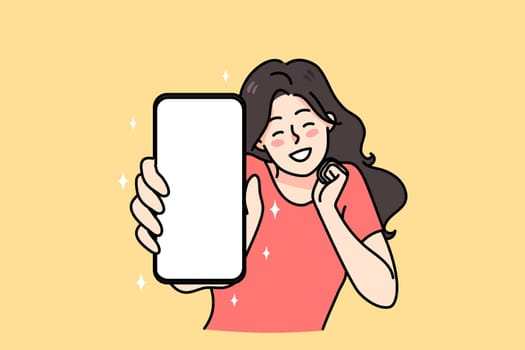 Smiling girl show smartphone with mockup screen