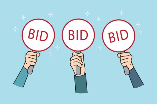 Taking part in auction concept. Human hands holding and raising up sings with bid lettering takins part in auction sales vector illustration