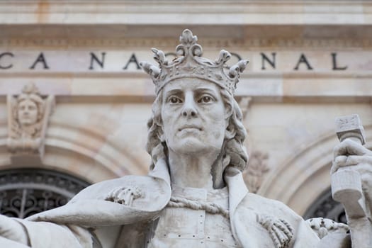 Madrid, Spain - March 6th, 2021: Alfonso X of Castile sculpture at National Library of Spain, Madrid. Sculpted by Jose Alcoverro Amoros