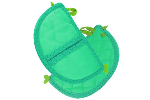 Kitchen textiles. Colorful green pot holders with hearts for hot things in kitchen isolated on a white background. Top view.