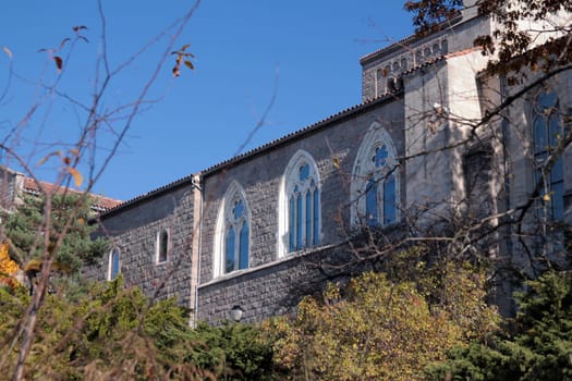 Close up of the white arch windows of the Cloisters in New York City