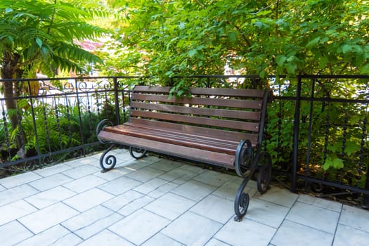 Beautiful forged bench in a well-maintained place
