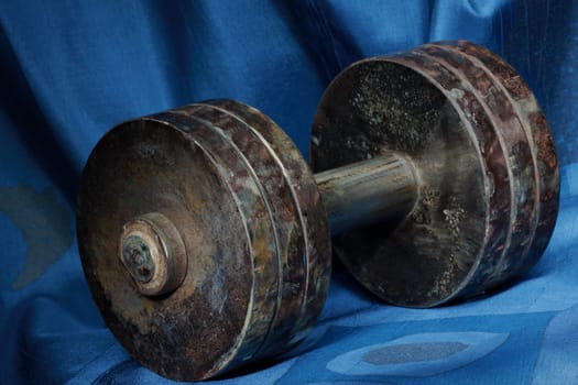 big heavy rusty dumbbells close-up
