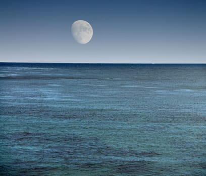 Large moon over the Pacific ocean California