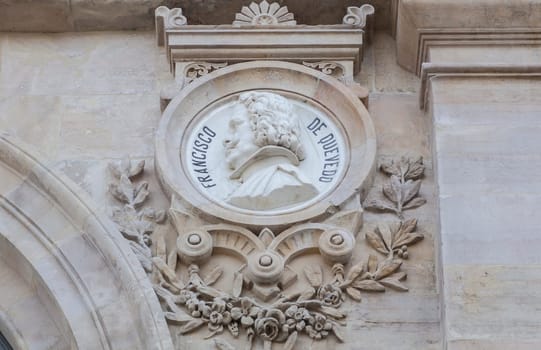 Madrid, Spain - March 6th, 2021: Francisco de Quevedo medallion at National Library of Spain, Madrid. Spanish writer of the Baroque era