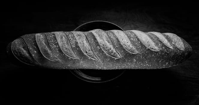 French bread baguette on wooden backround