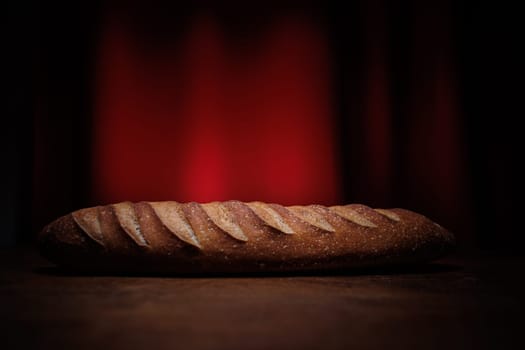 Homemade french bread baguette on wooden backround