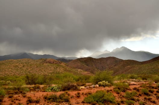Raining Mountain surrounding Roosevelt lake in Central Arizona