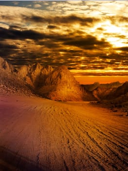 Desert landscape with dramatic sky
