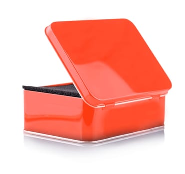 The Opened Empty red metal box close-up isolated on white background