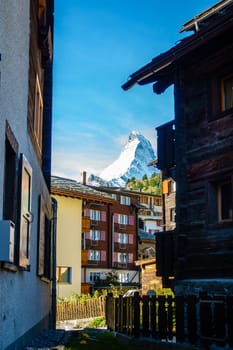 A street in the Swiss resort town of Zermat with a view of Matterhorn