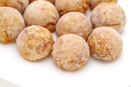 Japanese food, Frozen Takoyaki ball made of flour and octopus on white background