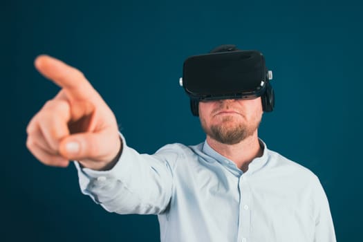 Metaverse digital cyber world technology. Businessman with VR glasses using AR augmented reality NFT, futuristic lifestyle concept