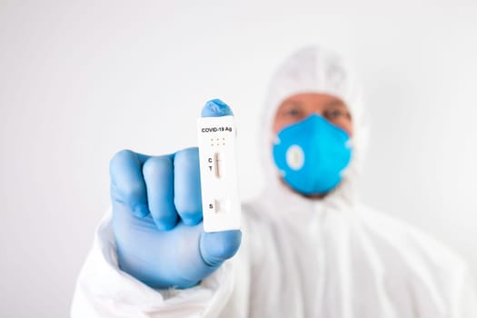 Doctor show rapid negativ laboratory COVID-19 test for diagnosis Coronavirus infection. Pandemic infectious concept