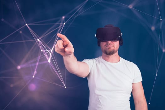 Metaverse digital cyber world technology. Man with VR glasses using AR augmented reality entertainment. NFT, game, futuristic lifestyle.